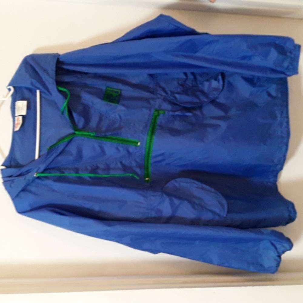 Wind Breaker Over the Head Blue with Tigger on front and back.